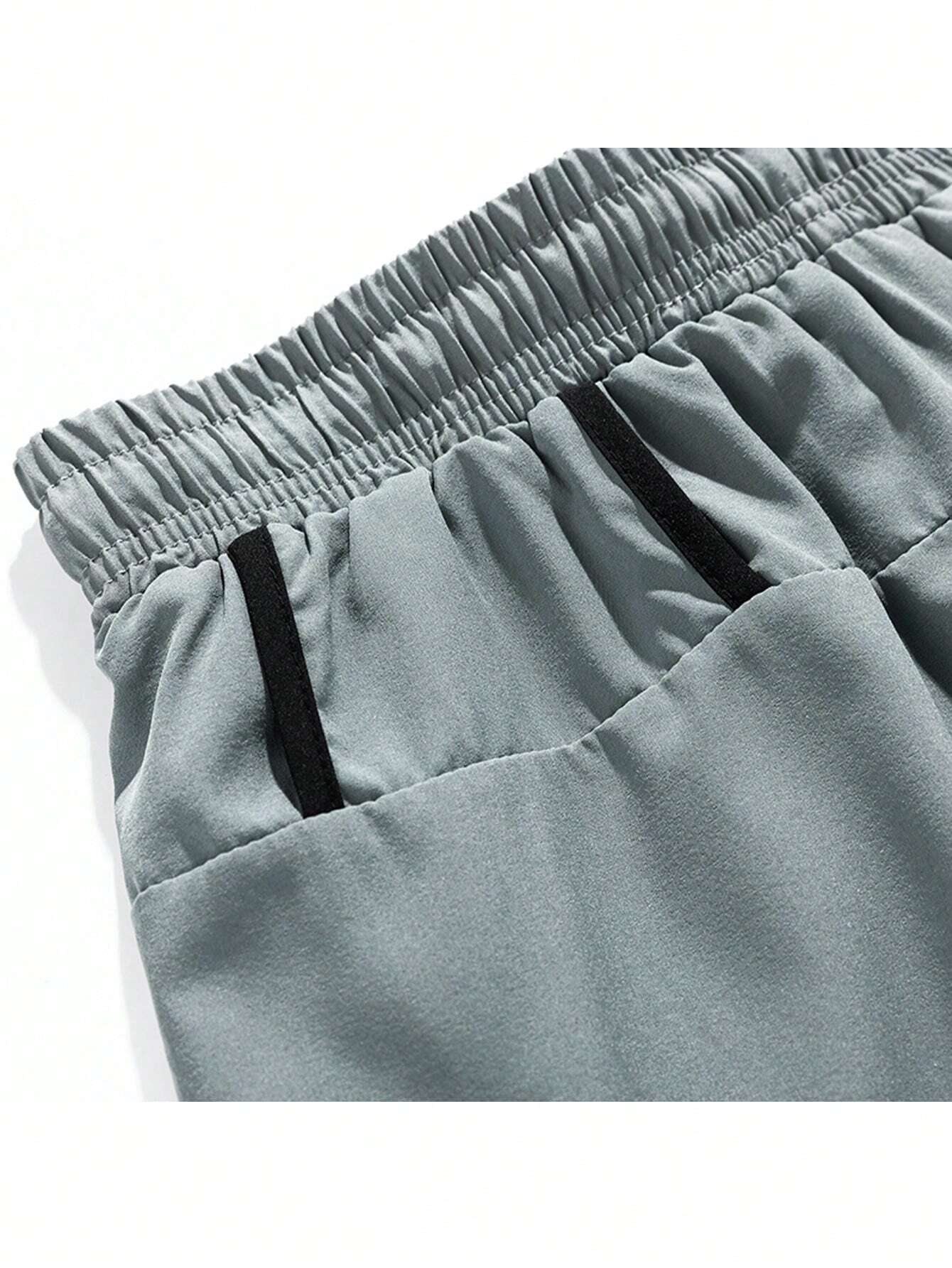 Pantalones cortos deportivos casuales sueltos transpirables con detalles de color contrastante para hombres - Imagen 6