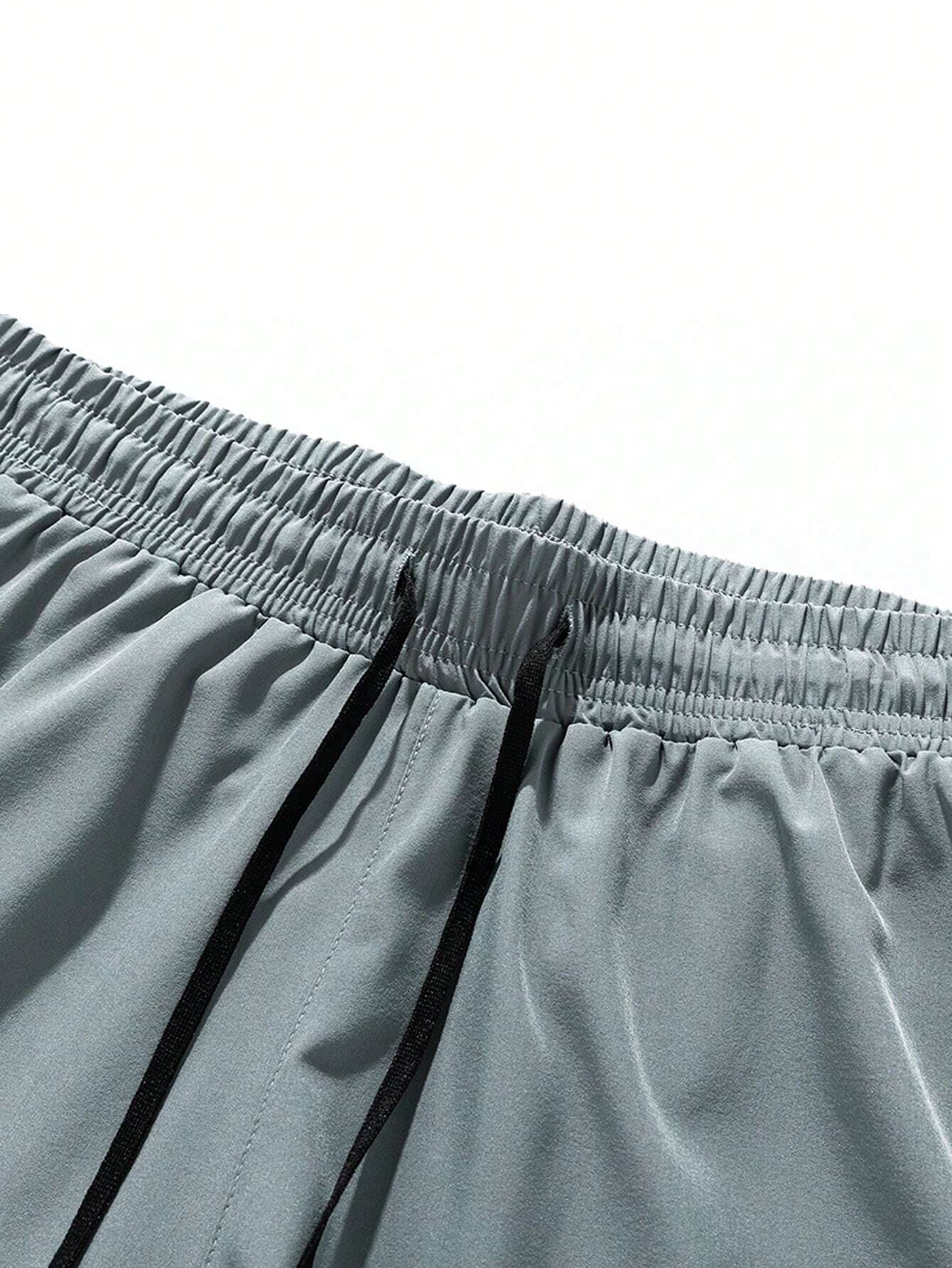 Pantalones cortos deportivos casuales sueltos transpirables con detalles de color contrastante para hombres - Imagen 5