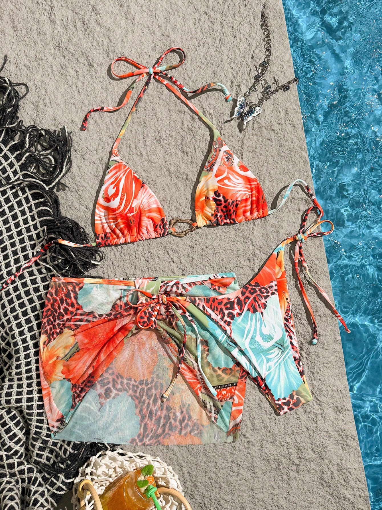Nuevo_conjunto_de_traje_de_bao_de_3_piezas_para_mujer_con_minifalda_estampado_de_leopardo_y_flores_con_hebilla_de_metal_para_playa_y_fiesta_de_piscina_en_primavera_y_verano_main_0 Nuevo conjunto de traje de baño de 3 piezas para mujer con minifalda, estampado de leopardo y flores, con hebilla de metal, para playa y fiesta de piscina en primavera y verano - Imagen 1